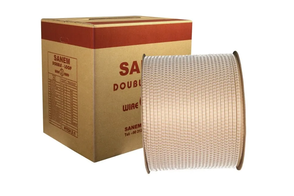 Spool of white 2:1 wire binding coil in front of its carton