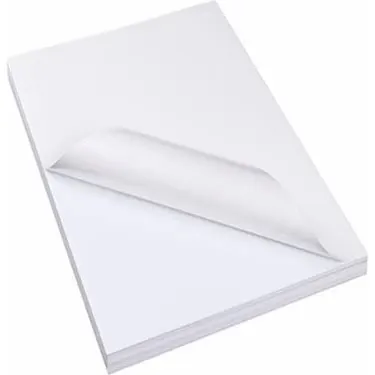 White self-adhesive paper sheet with a peeled corner