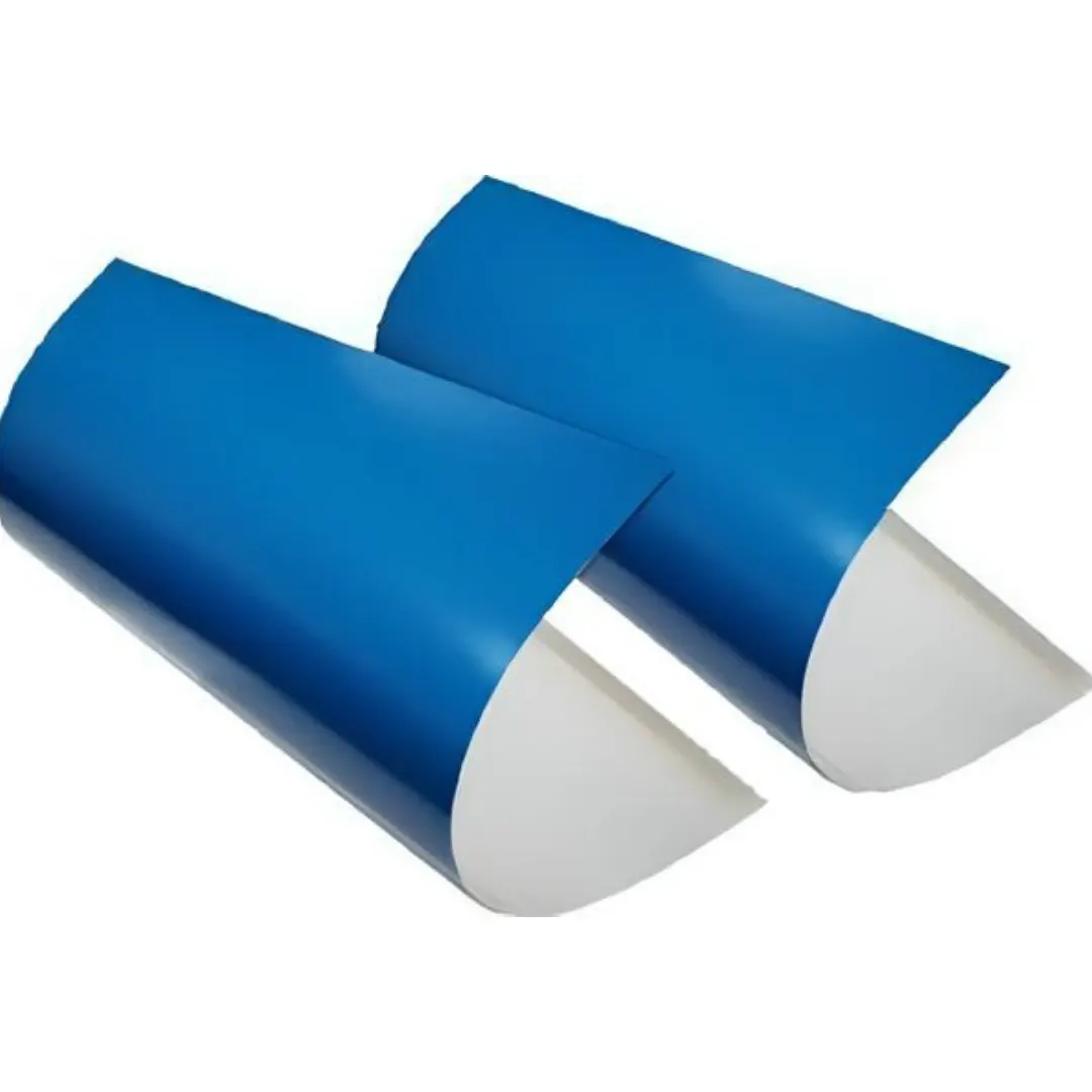 Two curled blue-coated CTCP printing plates
