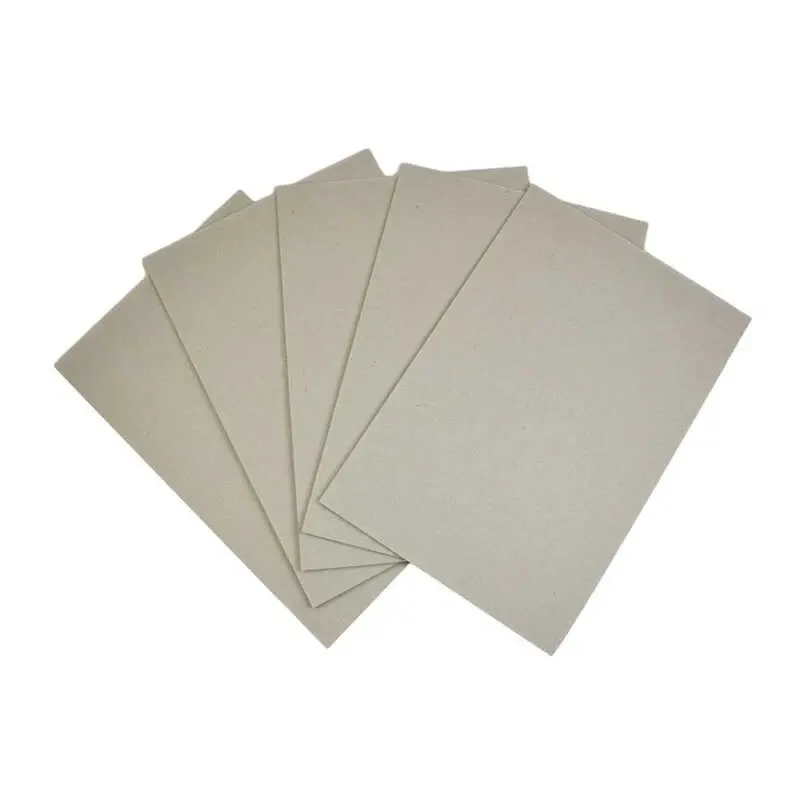 Sheets of grey-backed coated folding boxboard